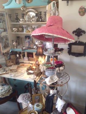 Mix of antiques with handmade vintage inspired home goods and jewelry.