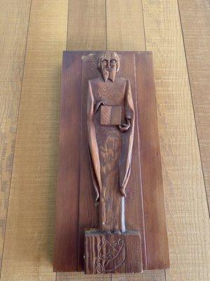 St. Luke (wood carving - located by the entrance doors)