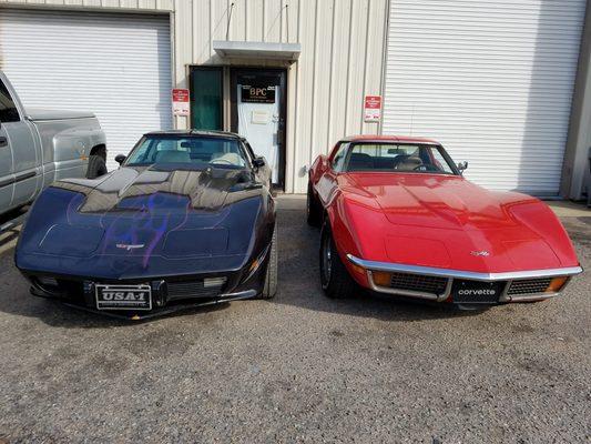 Corvettes in front of our shop