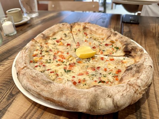 Clam Pie (clams, garlic, provolone, parsley, roasted peppers, lemon)