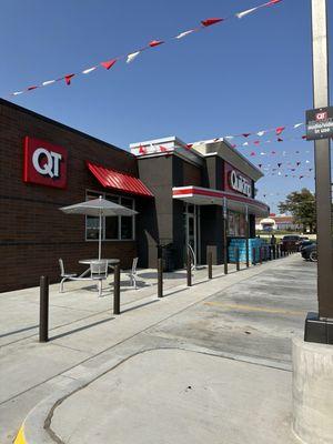 Entrance of building and outdoor tables