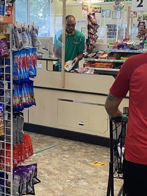 Cashier working without a mask on 9/2/20.