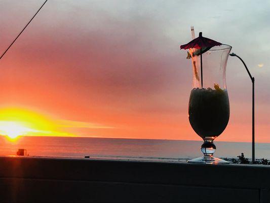 Sip away & soaking in the stunning sunset!