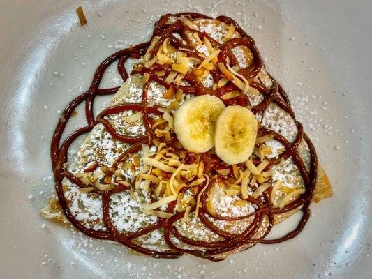 Paradise Crepe with roasted coconut, banana and Nutella