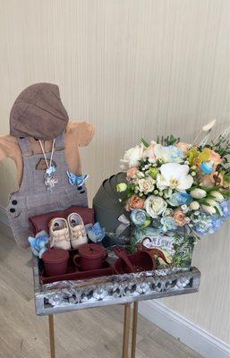 Baby Elliot's flower/gift basket made and delivered by Aria's Flowers