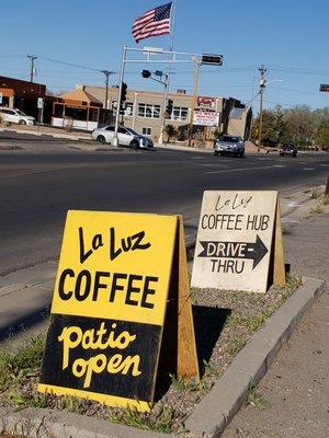 Signs by the sidewalk