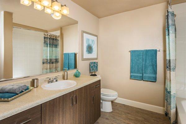 Bathroom with bathtub and shower at Southern Ave Villas