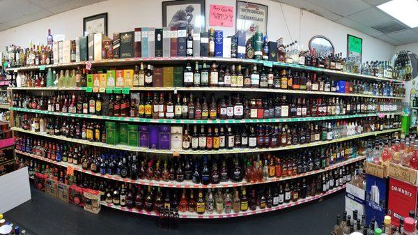 Wall of whisky, scotch, brandys, rum, tequila and bourbon