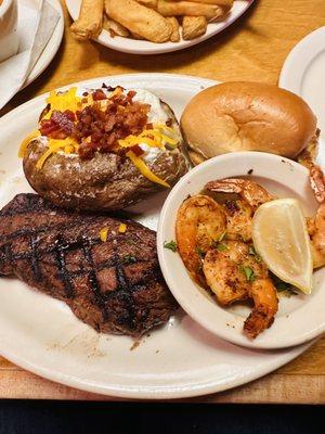 8 oz. Filet and Grilled Shrimp Combo  with a loaded baked potato