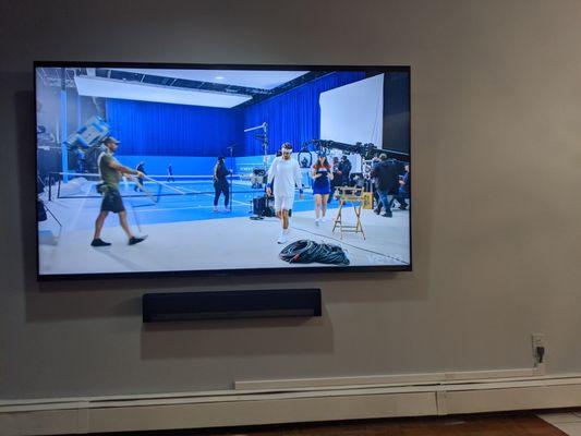 Wall mounted 85" TV