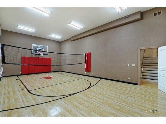 Half-court sports court in the basement of one of our professional athlete client's luxury homes in the North Shore area of Chicagoland