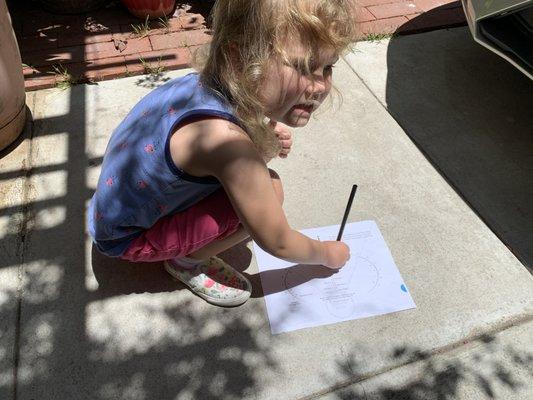 Using the sun to tell time on their own sun dial