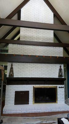 Painted brick fireplace