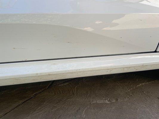 Dirt streaks under car door