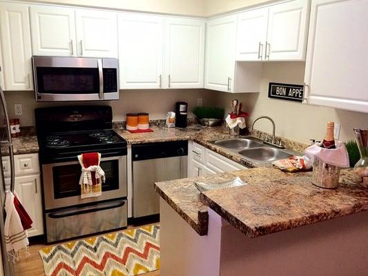 Newly remodeled kitchens with granite-style counter tops