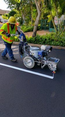 Complete striping service for parking lots and roadways