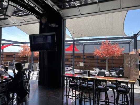 Open air space with garage doors open