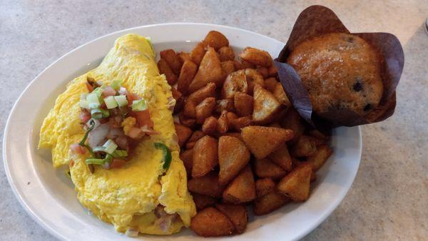 My husband's Wild Omelet with potatoes and a Blueberry muffin.