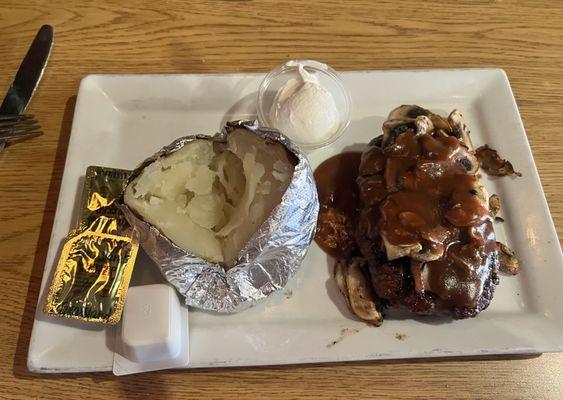 Chopped steak w/mushroom gravy and baked potato.