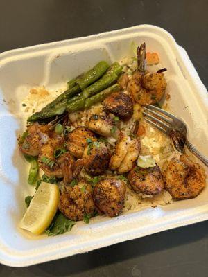 Shrimp and scallops over rice