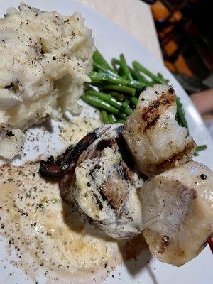 Steak topped with scallops - special