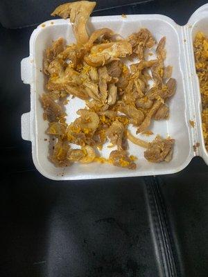 Twice microwaved "chicken" bits that we received in our 2 large chicken fried rice orders.