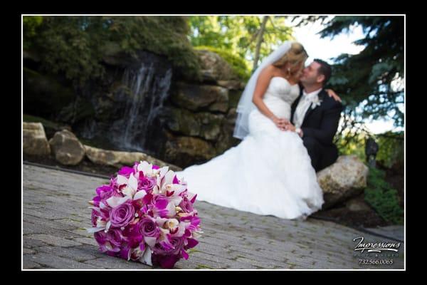 Beautiful posed portrait in our garden area at Grand Marquis. Photograph provided by Impressions Photo and Video.