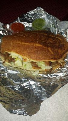 Homemade pork torta. The pork is delicious. $6 and change includes tax