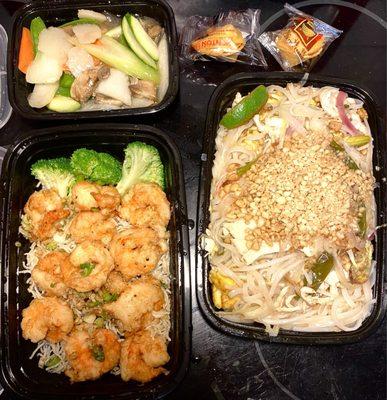 Top left: Vegetables packed separately from crispy garlic shrimp (bottom left) to prevent sogginess. Bottom right: Amazing Pad Thai!