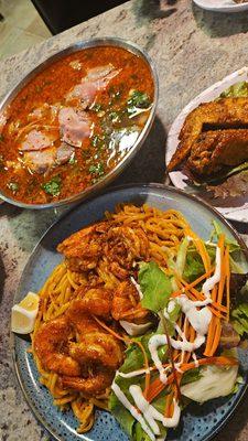 Cajun shrimp with garlic noodles, chicken wings, spicy lemongrass soup