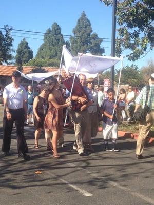 Carried by 1 of TBS' First Responders - the Torah scrolls return to their home Tabernacle.