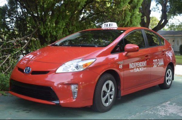 Toyota Prius in action helping all people get around town.