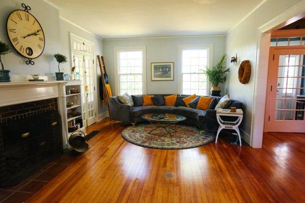 The large living room complete with working fireplace