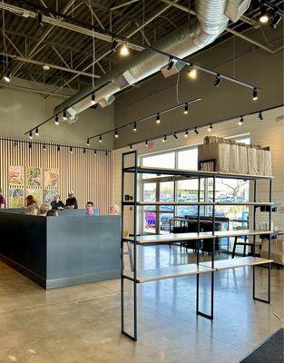 Seating area and shelving for takeout orders