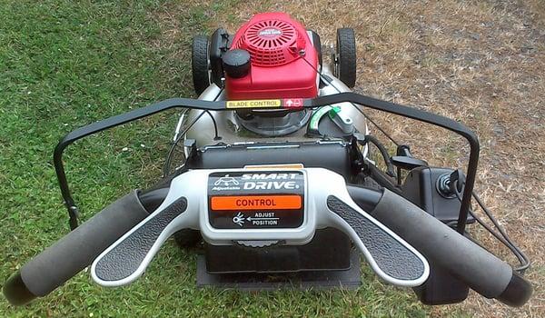 Honda model HRR216VLA - electric start, duel blades, self-propelled.  It's a nice push mower!