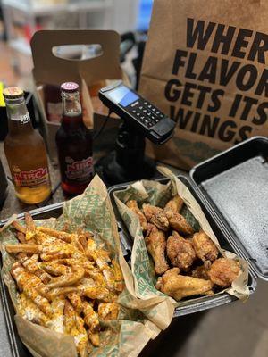 Loaded fries with cheese & ranch & classic Lemon Pepper wings & more goodies in the bag!