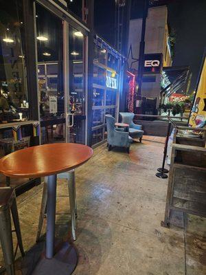 Comfortable outside seating at negociant and divas kitchen