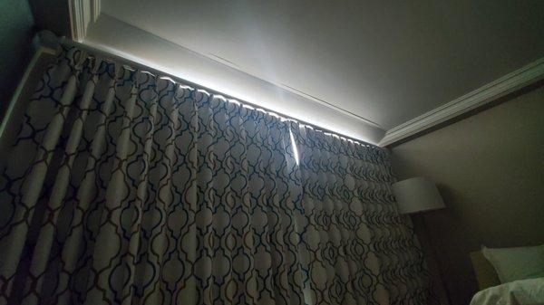 The "blackout curtains" don't actually block out the sun. They are installed too low.