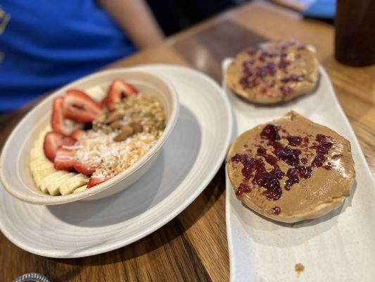 Traditional Açaí bowl and plain bagel with PB and strawberry jam