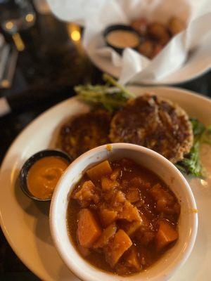 Sweet potatoes and wings that are out of focus