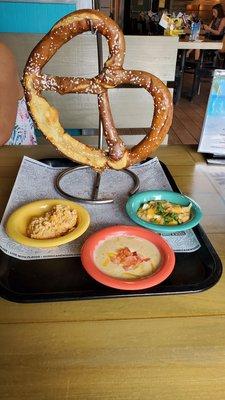 Giant Bavarian pretzel. Shrimp, beer cheese and pimento dipping sauces.