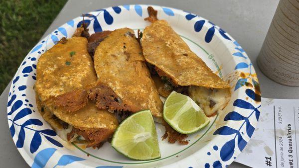 #1 Birria tacos.  Meat and cheese stuffed, then fried, dipping consomme on the side