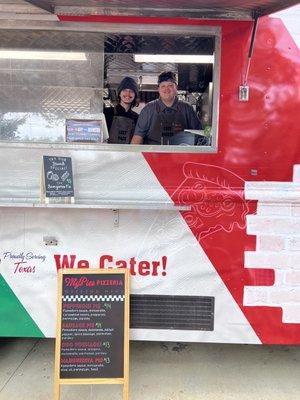 Chef Garreth and Chef Pack serving up pizza at the Dallas Truck Yard