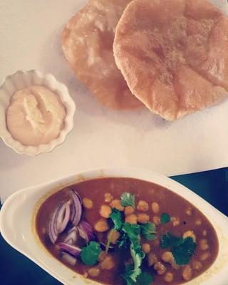 Channa Masala with Puri (chickpeas and fried roti) makes for the ideal Indian breakfast fit for a Queen or King