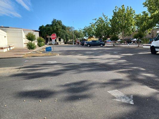 Vehicles still parked at post office at the time I found my car gone. There is only one side of lot blocked.