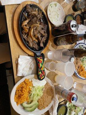 Chicken & Steak fajitas with fajita side plate (rice, beans, avocado)