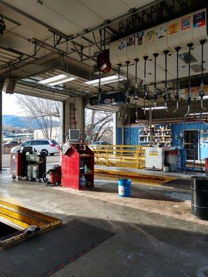 Inside view of lube center. 3 bay shop where 3rd bay is reserved for interlock services and other bays are for thorough oil changes.