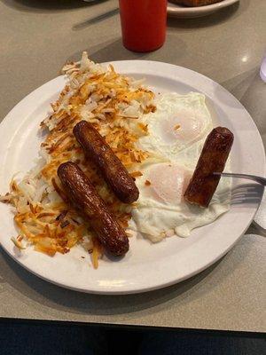 Two large ranch eggs with sausage and hash browns