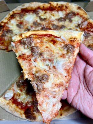 Medium sausage and onion pizza slice