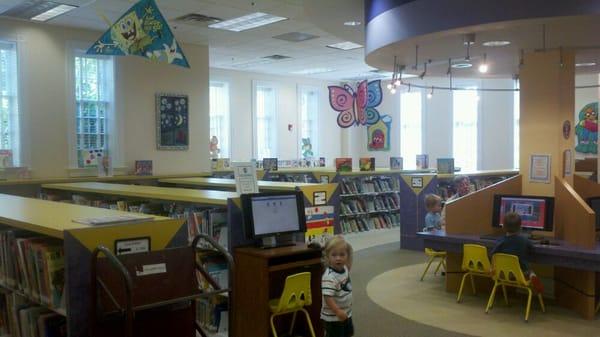 Toddler books, computers, games, and reading nook.